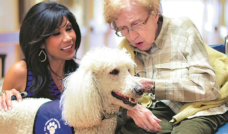 Lin Sue Cooney and her dog Max with patient