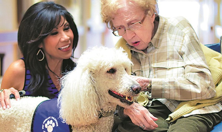 Lin Sue Cooney and her dog Max with patient