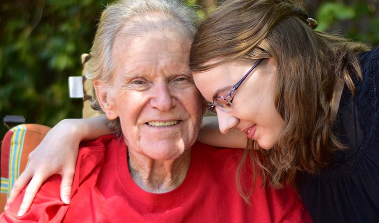 College volunteer visiting a patient