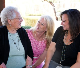 Three females talking