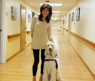 Lin Sue Cooney with therapy dog Max