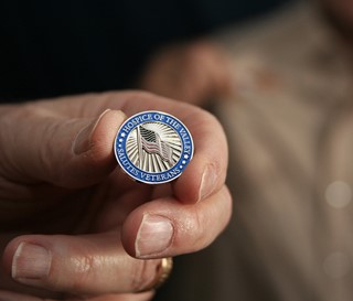 Salutes program pin