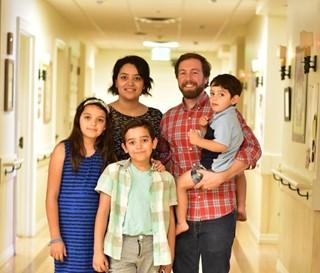 Maricela and Derek Kempf and family