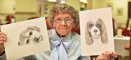 Artist Inga with pet portraits