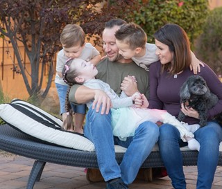 Patient Reesa Stutzman with her parents and siblings