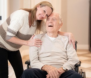 Social worker Joy Martin enjoys her visits with patient John Tracey