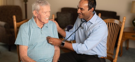 Gobi Paramanandam, Medical Director checking heart rate of patient