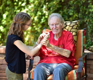 Volunteer comforting dementia patient