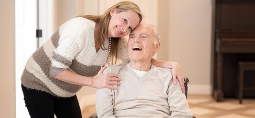 Social Worker comforting male patient