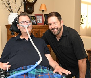 ALS patient Mark Adinolfi and Volunteer Jeff Riddle