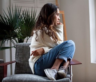 Grief Support, female sitting in chair