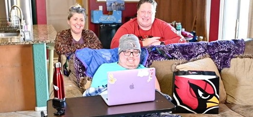 Social worker Katie Cozby with patient Boyce Martinet and his parents