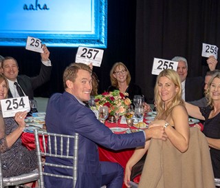 AAHA Bidders sitting a table