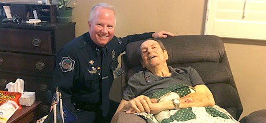 HOV volunteer and Mesa police Cmdr. Bill Peters visits with Walter Schutt, a former police chief.