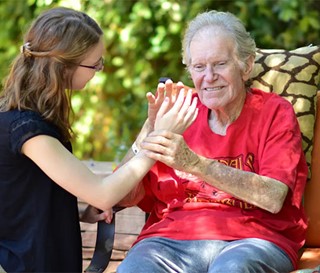 ASU student comforts patient