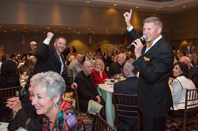Attendees at the live auction