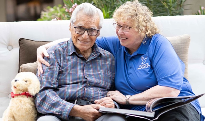A patient and an HOV staff member smile together