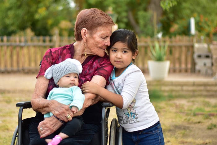 Altagracia Zamora with her grandchildren