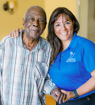 Social worker Marcela Vazquez Bowler visiting with patient Lucius