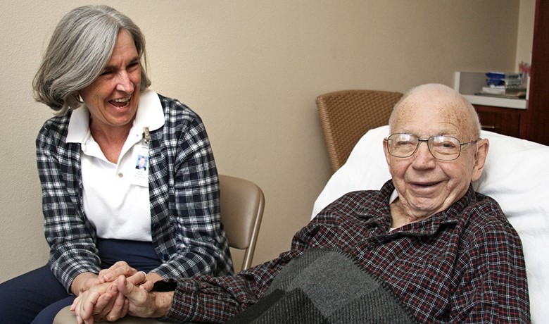 Volunteer Sue Danesi with a patient