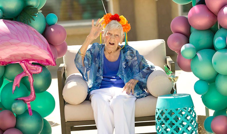 Opal Grandon surrounded by balloons