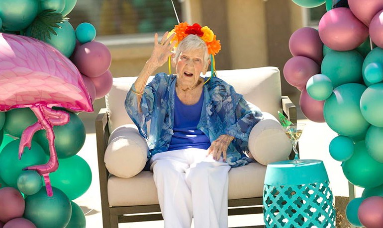 Opal Grandon surrounded by balloons