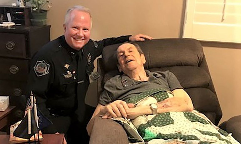 Bill Peters sitting beside Walter Schutt