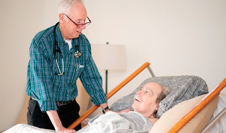 Dr. John Williams with patient