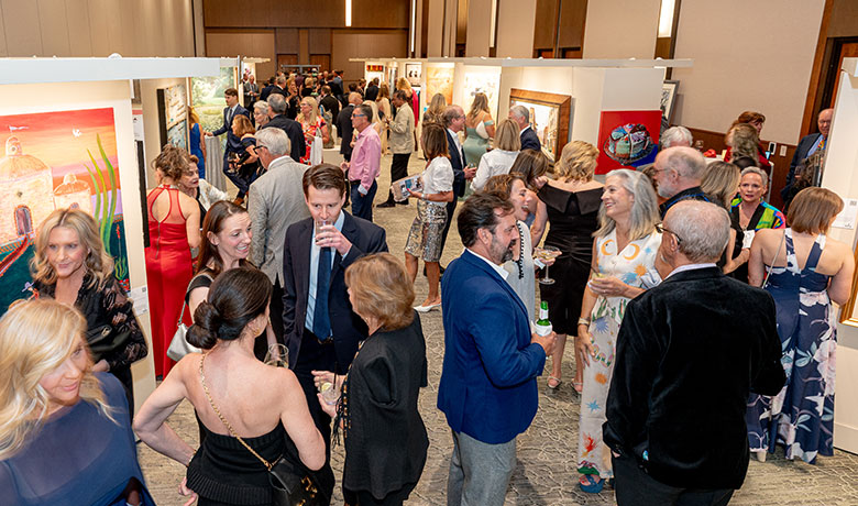 People walking about art gallery at aaha annual event