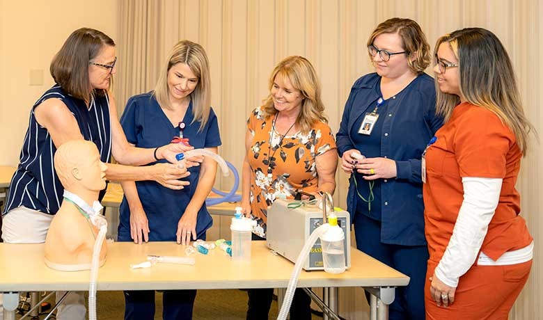 Pulmonary Team training employees on respiratory equipment