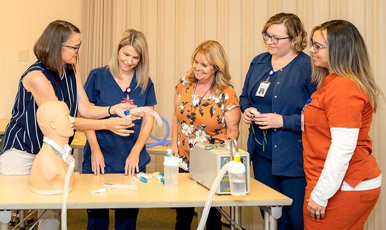Pulmonary Team training employees on respiratory equipment