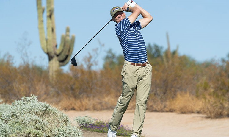 Tim Louis swinging golf club