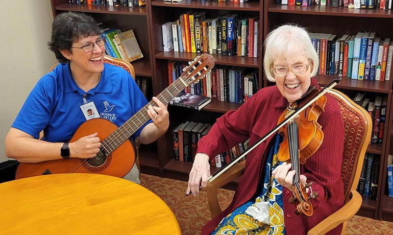 Hospice of the Valley music therapist Tammy Reiver and Nancy Scullion, her junior high music teacher, play some favorite songs together.