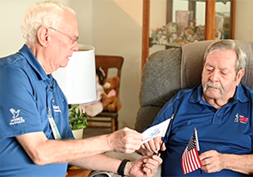 Saluting Our Veterans volunteer with Veteran