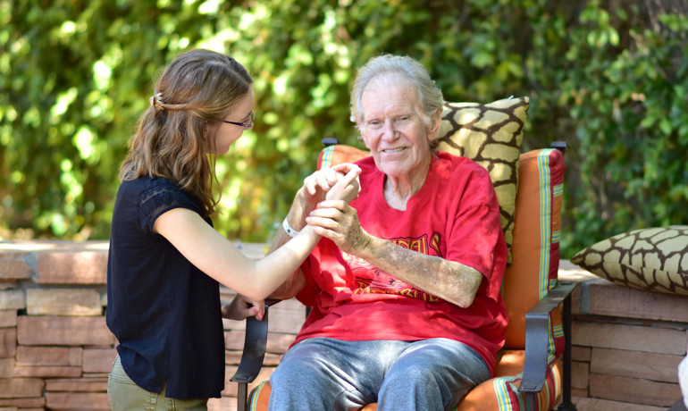 ASU student comforts dementia patient