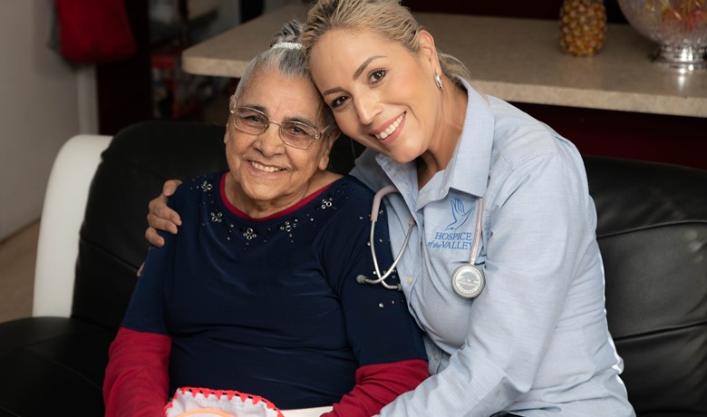 RN Erica Coronado hugging patient Isidora Dominguez