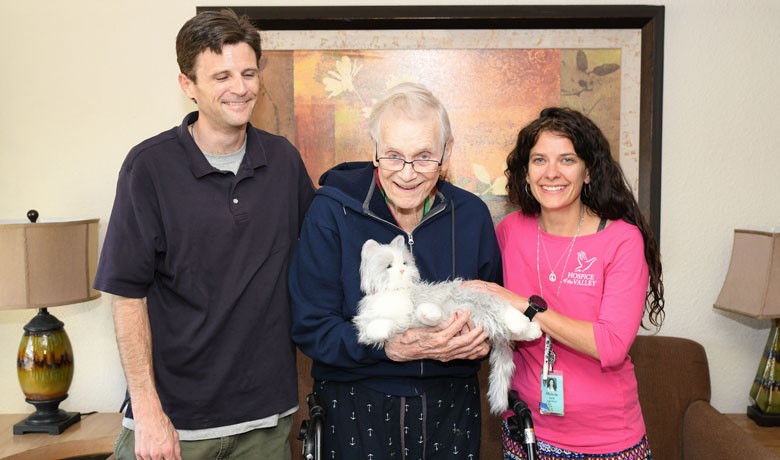 Andrew Gaines, Michelle Bales, and Walter “Wally” Brown with his mechanical cat